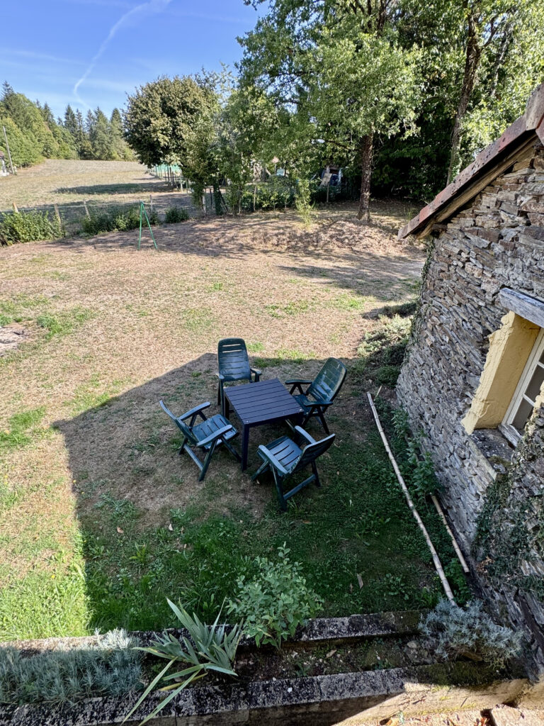 Vakantiehuisje op Camping La Bucherie in de groene Dordogne - achtertuin
